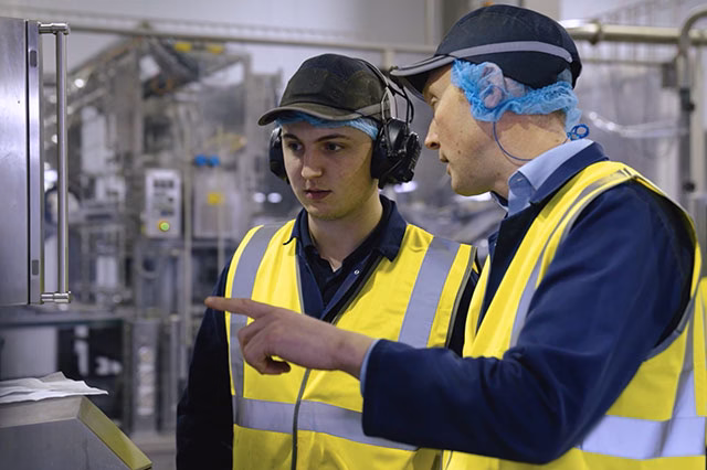 Mackle Petfoods apprentice working in manufacturing facility